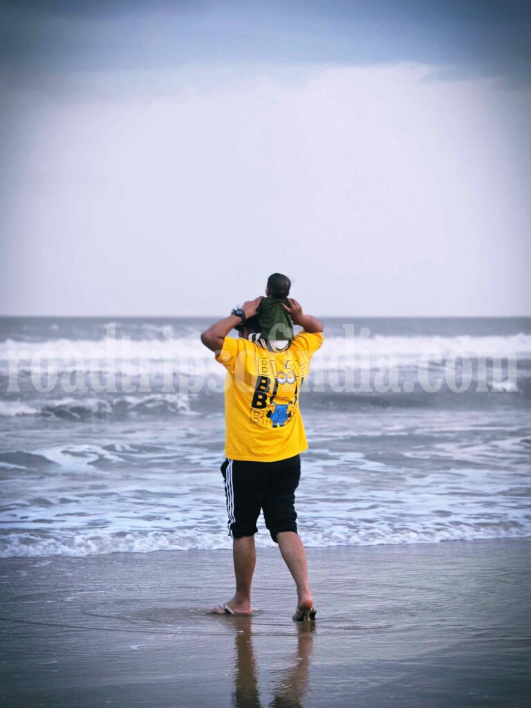 Enjoying sunset at Suryalanka Beach
roadtripsofindia.com